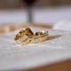 Two wedding rings on top of a child custody agreement