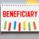 beneficiary word in a dictionary with colored arrows pointing at the word. designating a Beneficiary