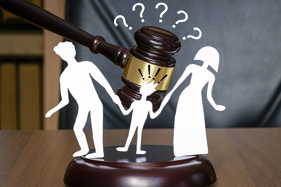 Child custody concept with gavel and family figures symbolizing when mediation fails in divorce cases.