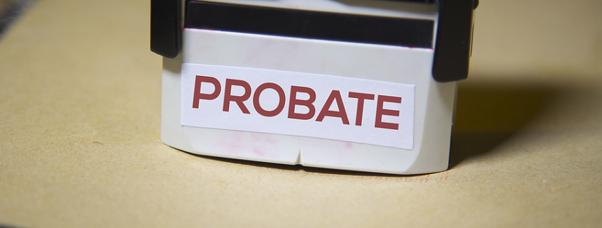 Probate process paperwork stamped “probate” in a thick file folder
