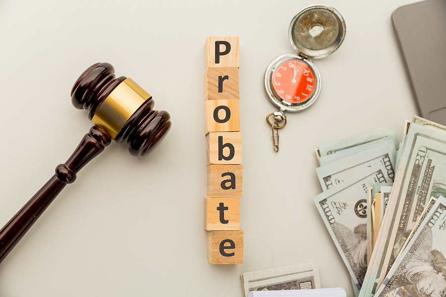 Probate process concept with wooden cubes spelling probate beside a gavel